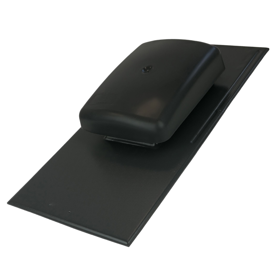 Black rubber mat with a rectangular black object on top against a white background