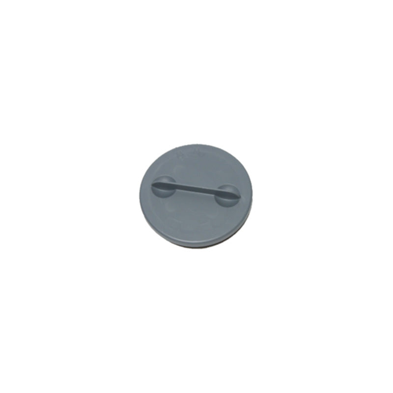 Gray circular object with a handle on a white background