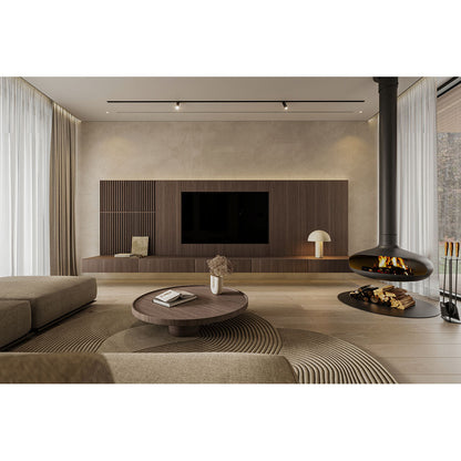 Modern living room with a fireplace, TV, and decor elements.